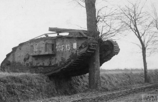 BRITISH MK IV tank F 13, 'Falcon II’ being tested against a large tree by a German crew. Taken by an official German photographer. Image Copyright: © IWM. IWM catalogue reference Q 87621. Original Source: http://www.iwm.org.uk/collections/item/object/205080960